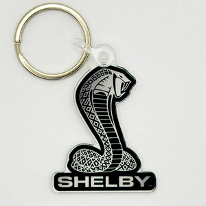 Top view of Shelby Cobra keychain in black and white