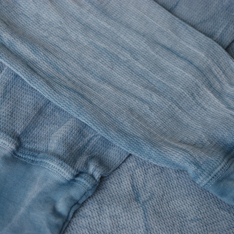 Pale blue thermal long sleeve shirt close up of shirt sleeves and cuffs