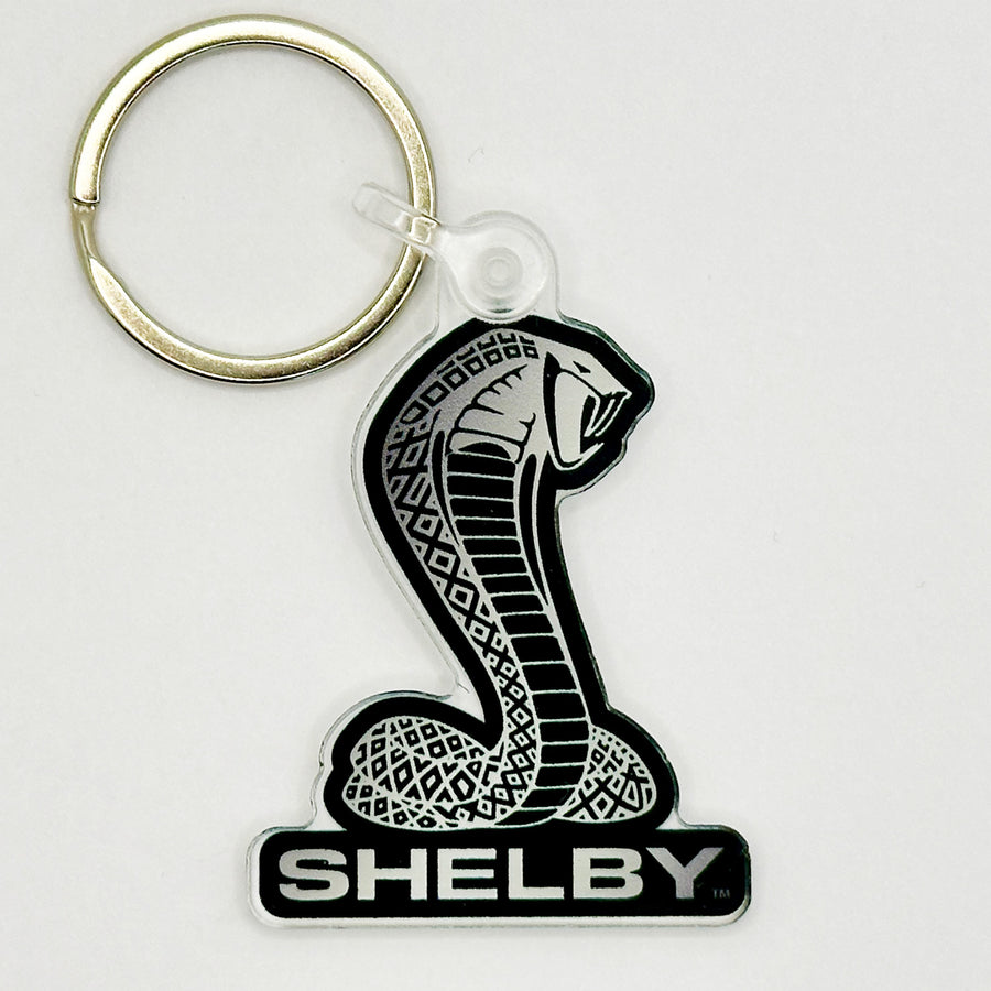 Top view of Shelby Cobra keychain in black and white