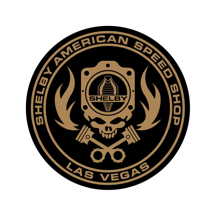 Black and gold Shelby American Speed Shop sticker with a skull, gasket, flames and a Shelby Cobra