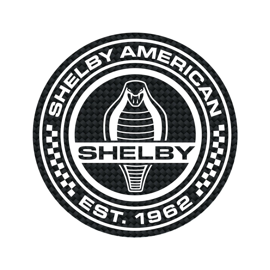 Black and white magnet with carbon fiber pattern, showing Shelby American Est. 1962 and a Cobra