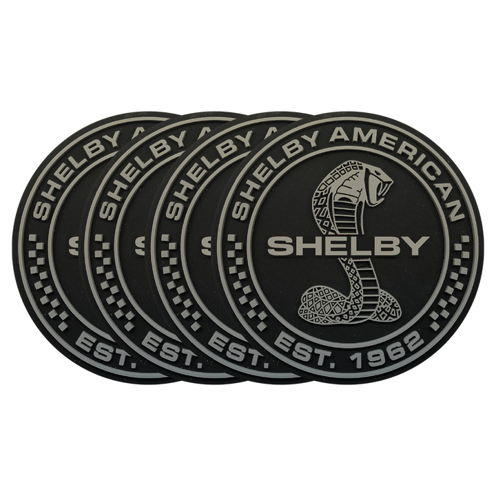 4 black and gray Shelby coasters lined up in a row