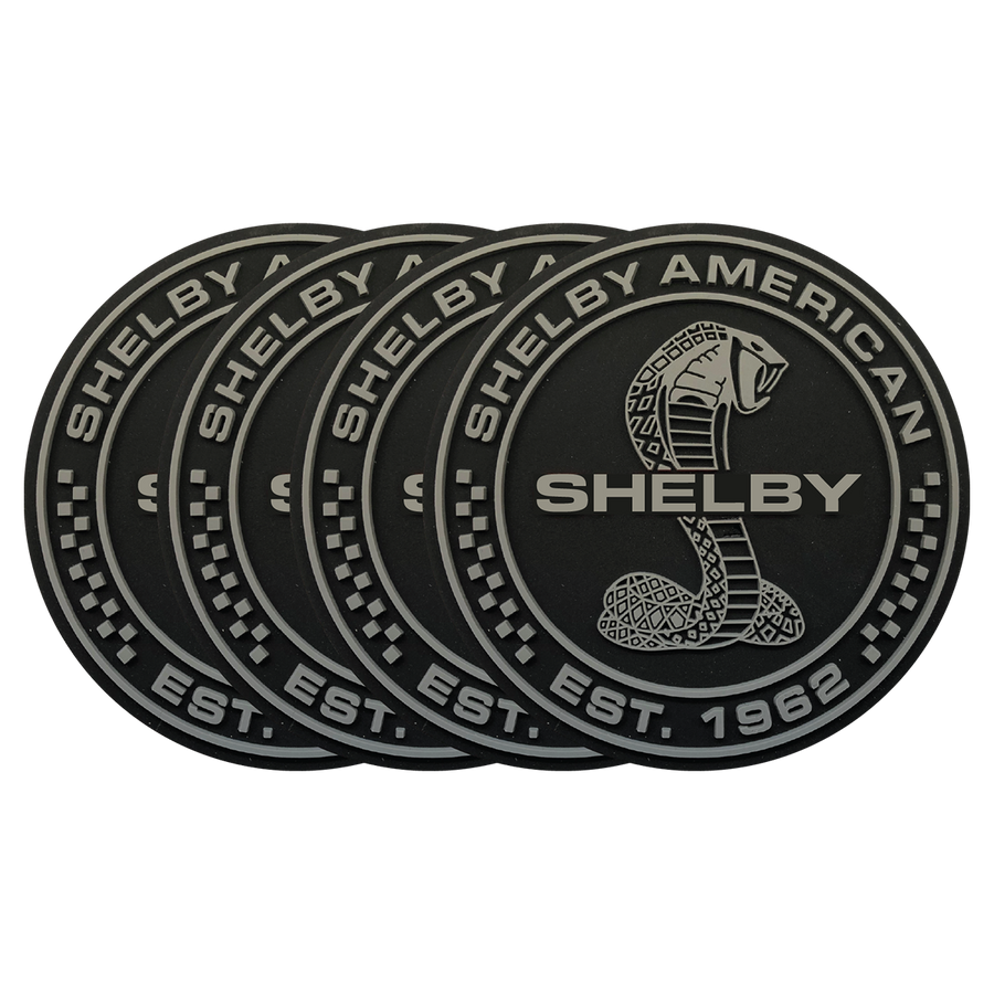 4 black and gray Shelby coasters lined up in a row