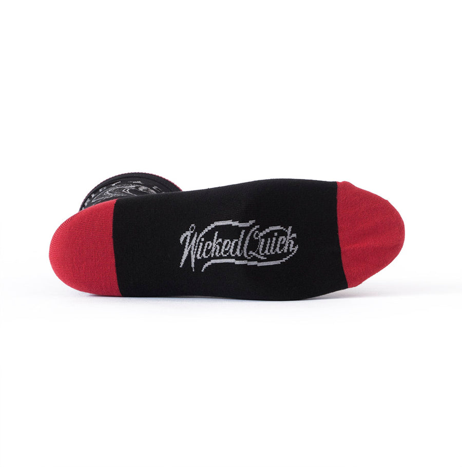 Bottom view of Shelby Cobra car themed socks in black and red