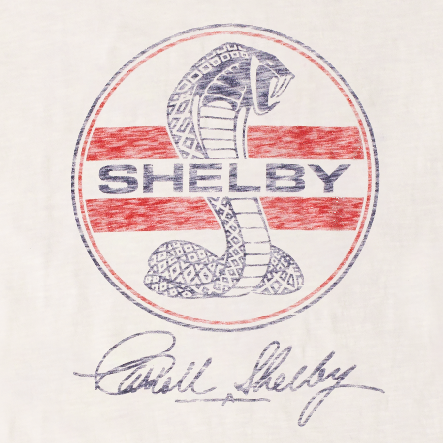 Close up of red Shelby Cobra graphic on a white t shirt
